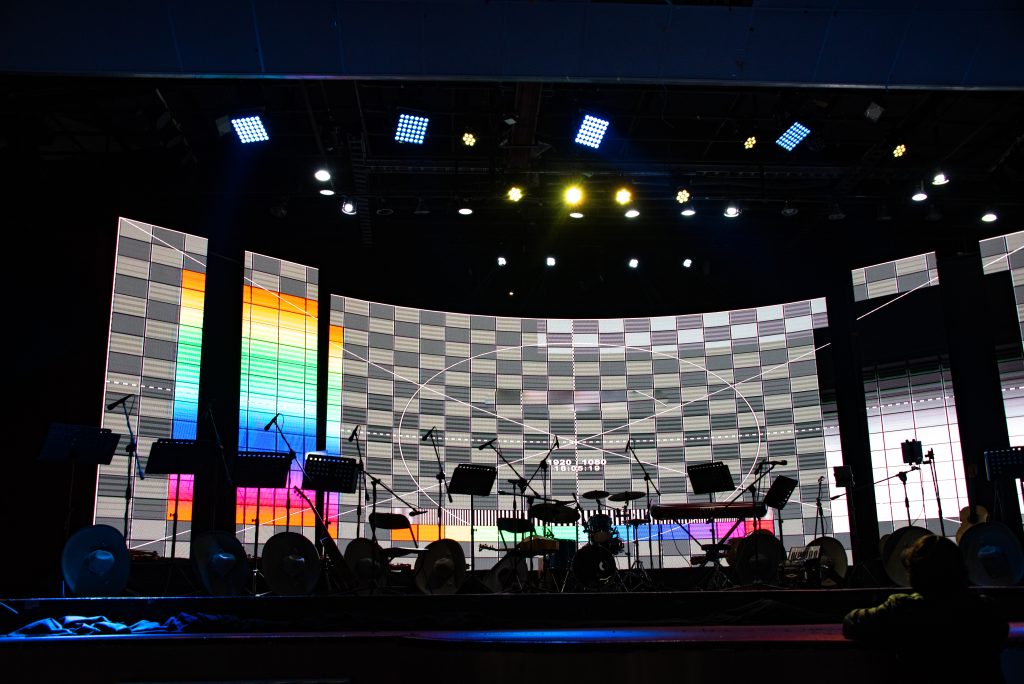 mariachi musical stage with lights, hats and instruments ready for performance